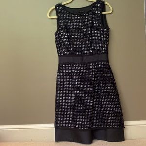 Carolina Herrera , dressier dress, tweed on top, taffeta on bottom hem